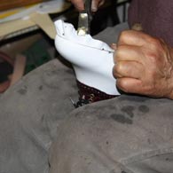 carmelo working on a custom golf shoe